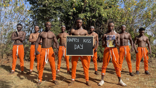 Afrikanisches Orange-Hosen-Team