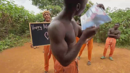 Afrikanisches Orange-Hosen-Team